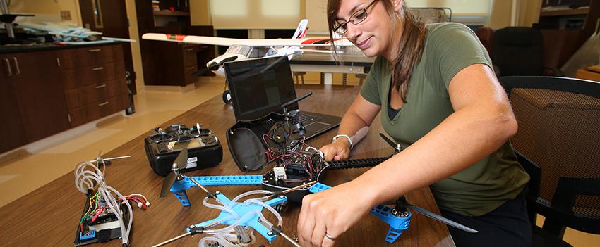 Engineering student working on drone